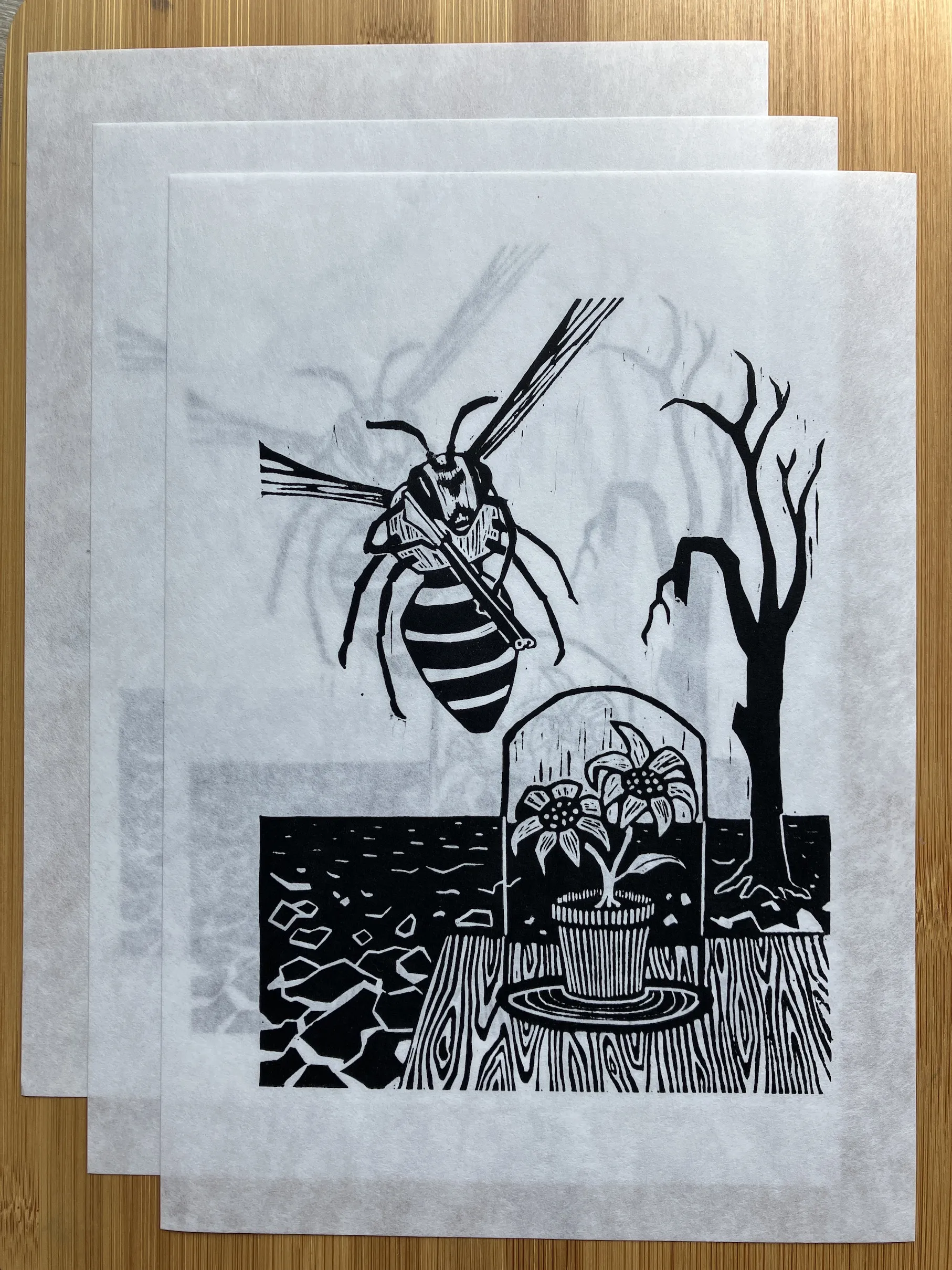 Multiple copies of the Bee Angry print stacked overlappingly, demonstrating the thinness and slight transparency of the washi paper.