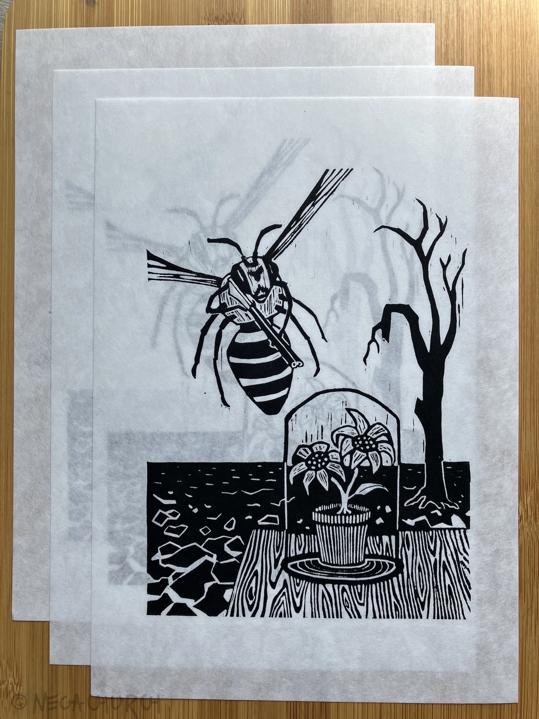 Multiple copies of the Bee Angry print stacked overlappingly, demonstrating the thinness and slight transparency of the washi paper.