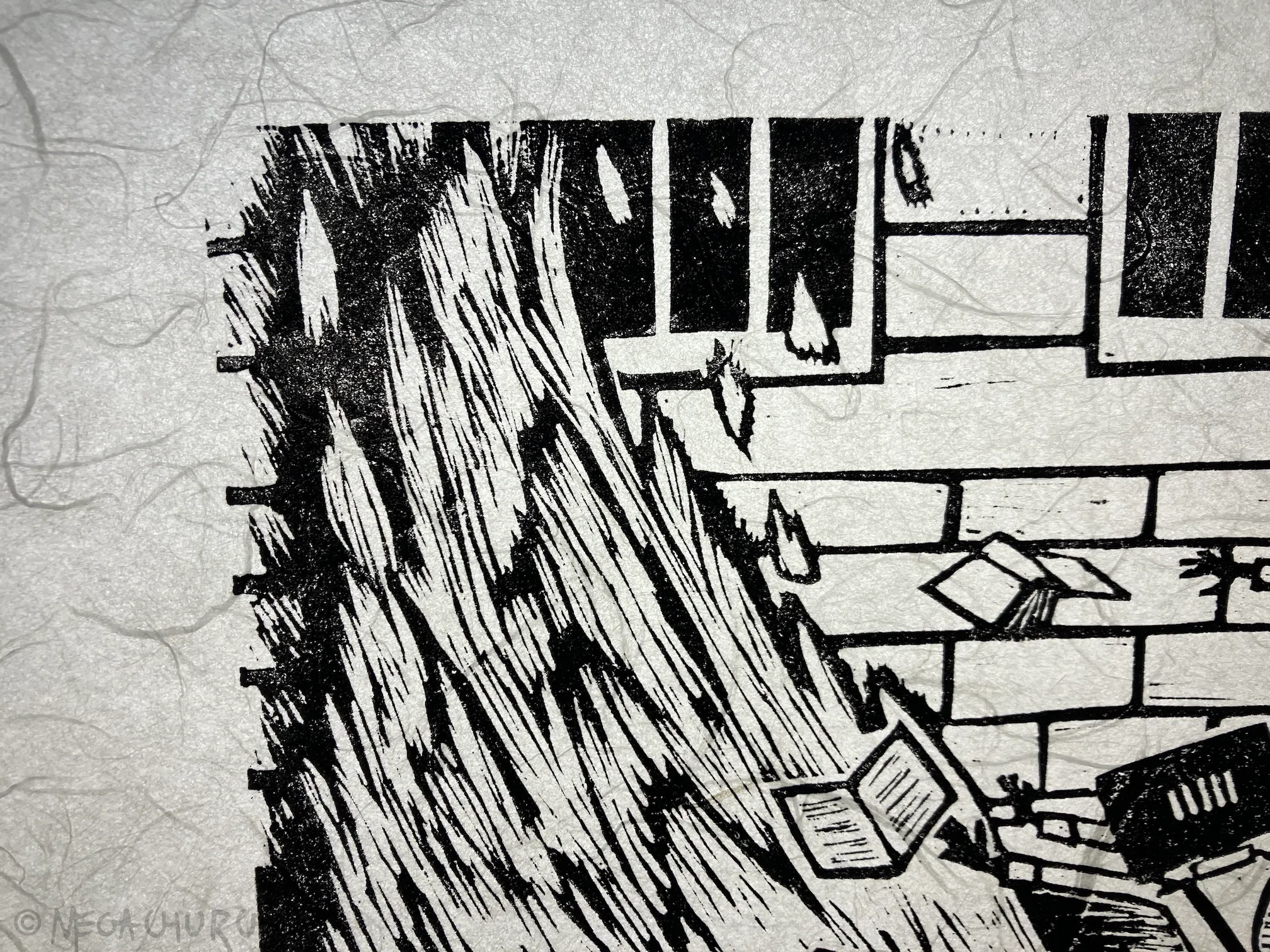 A close-up of the The End of Literacy print when backlit, showing the textured fibers of the paper.