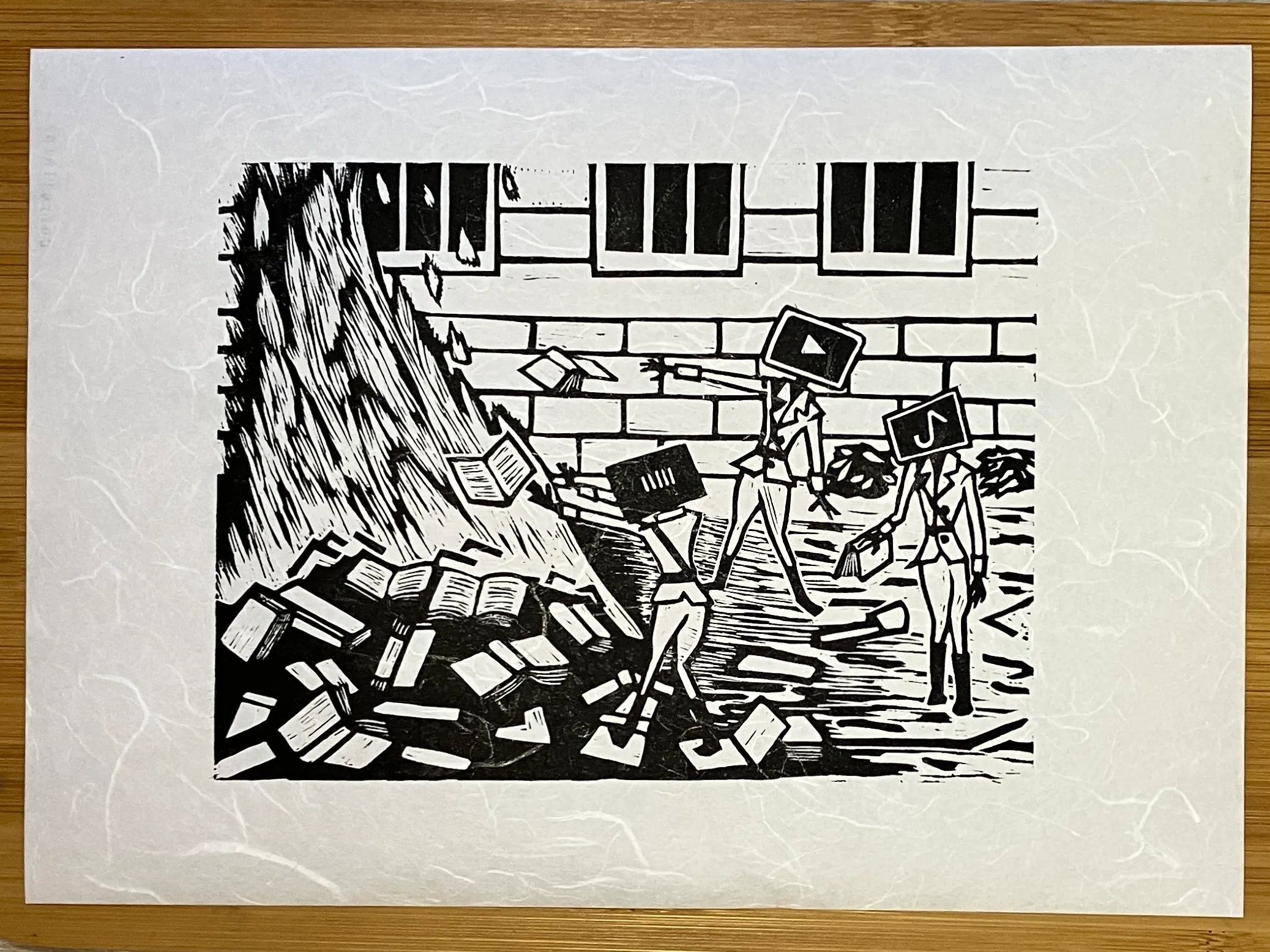 A relief print showing three figures in uniform tossing books into a giant bonfire. The figures have computer screens for heads and show what resemble logos of famous social media companies.