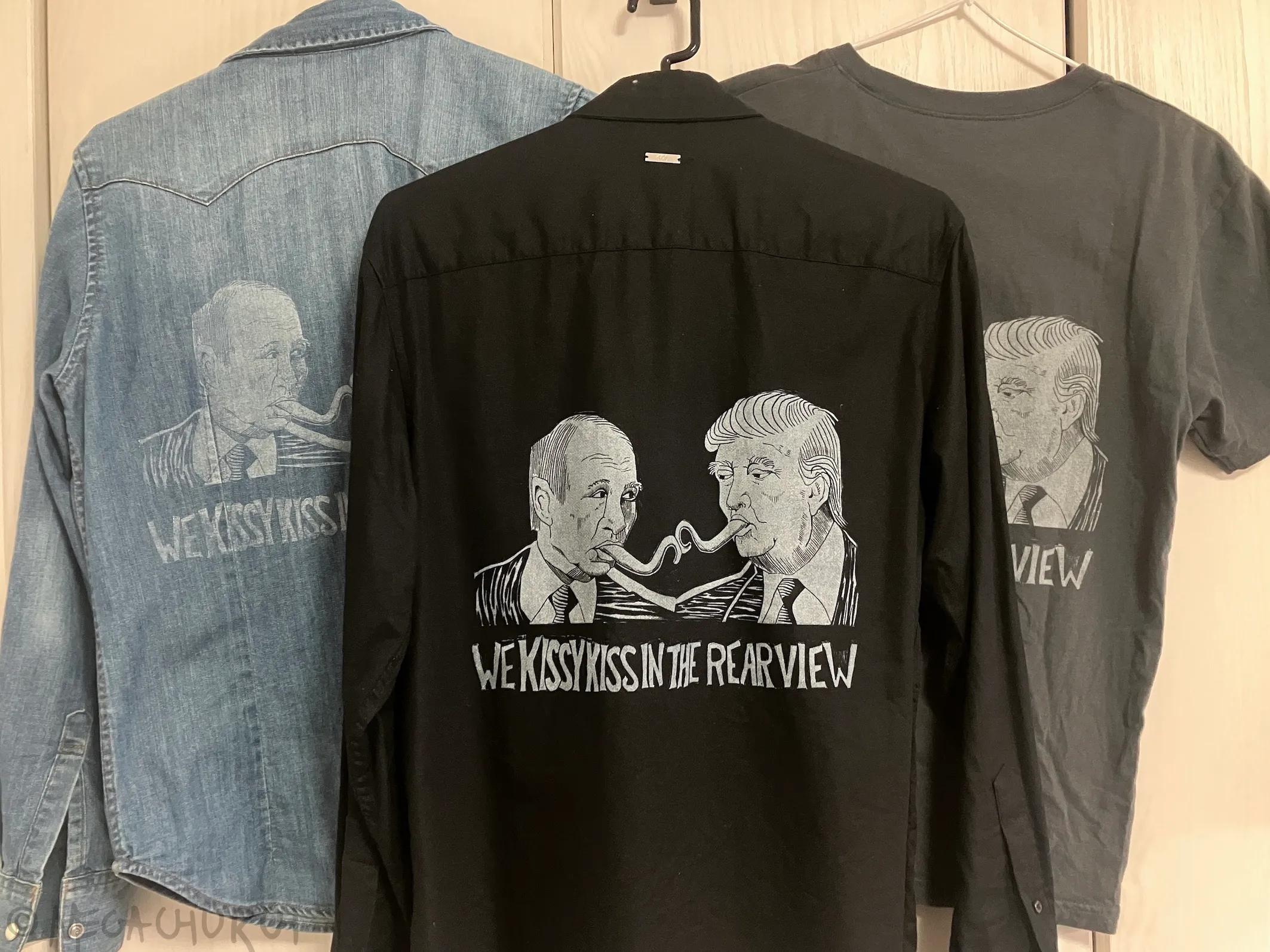 Three different styles of shirt with the Kissy Kiss image printed on each.