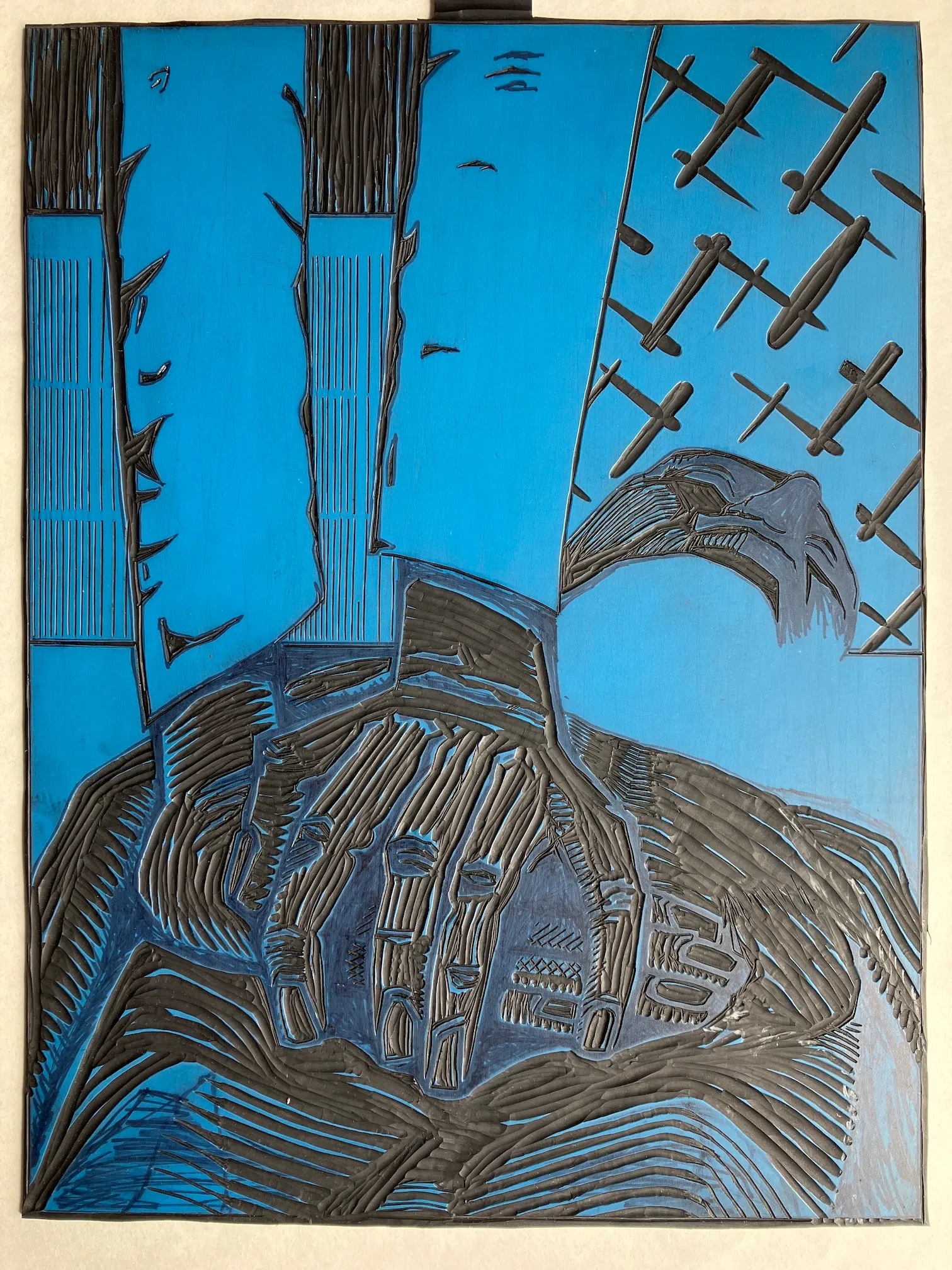 A vinyl plate into which the Resistance is Futile? print has been carved.