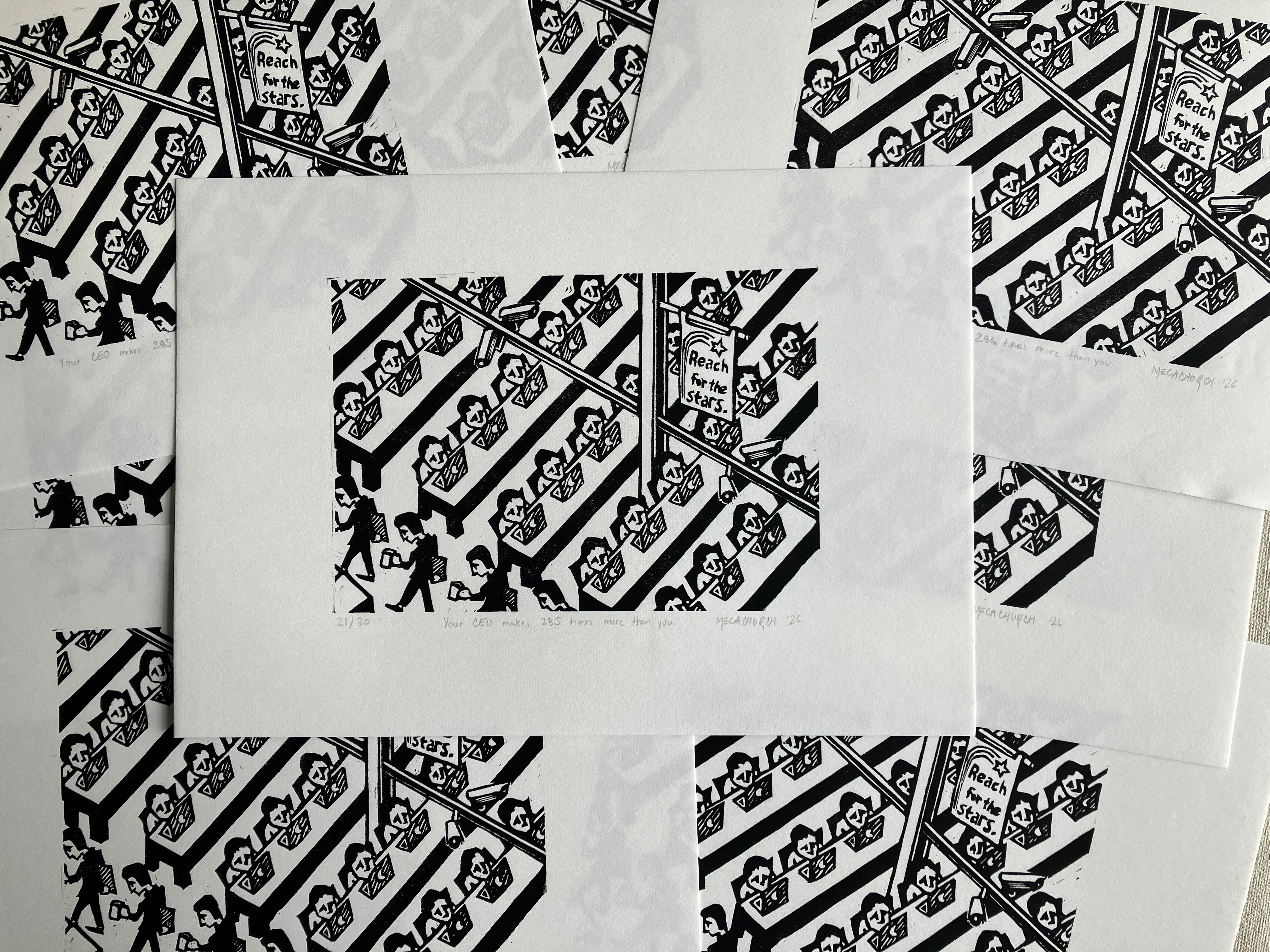 Several copies of the "Your CEO makes 285 times more than you" print arranged decoratively.